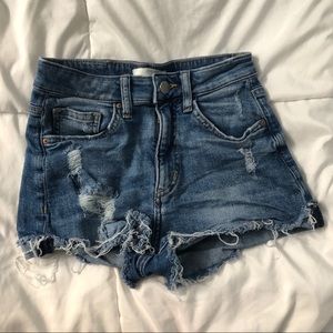 Distressed denim shorts